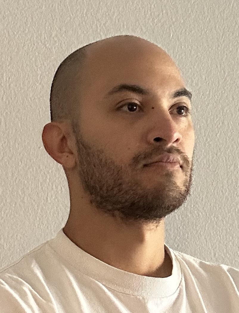 christian ventura in profile, looking off to the side